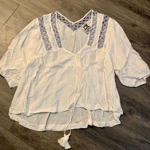Beachy blouse with crochet detail